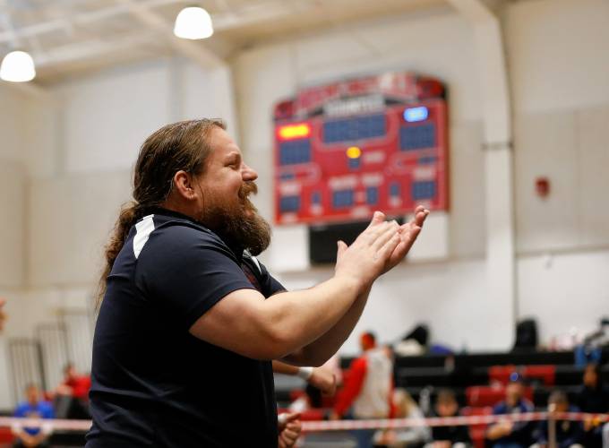 Frontier head coach Brian Bagdon reacts after Alexander Schreiber’s win in the 190-pound final Saturday during the MIAA Division 3 Western Mass wrestling championships at Mount Greylock Regional School in Williamstown. 